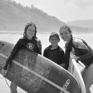Angela Lahman and family surfing in costa rica